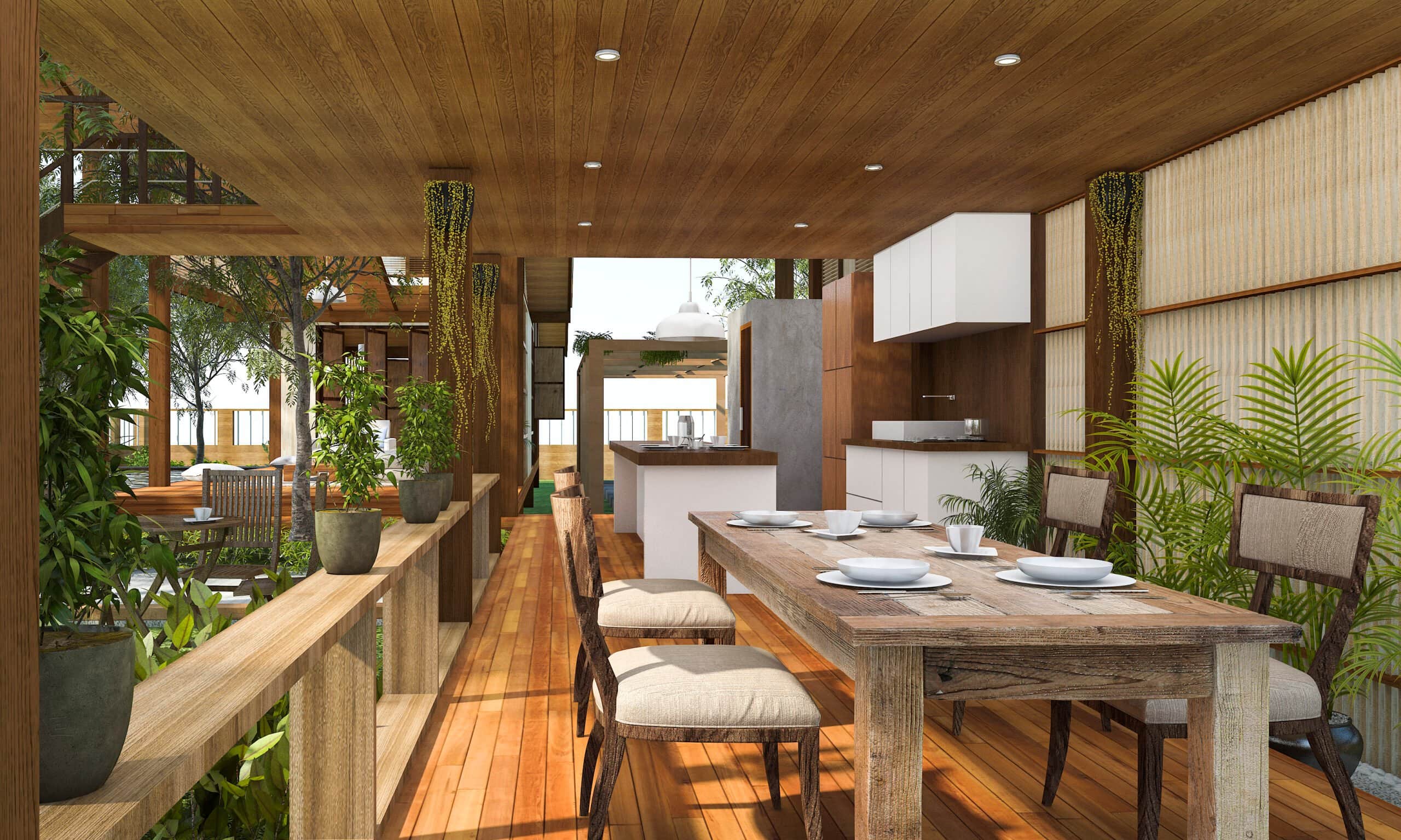 A modern, covered outdoor wooden deck featuring a long rustic dining table, a white minimalist kitchen island, and lush tropical greenery under a wood-paneled ceiling.
