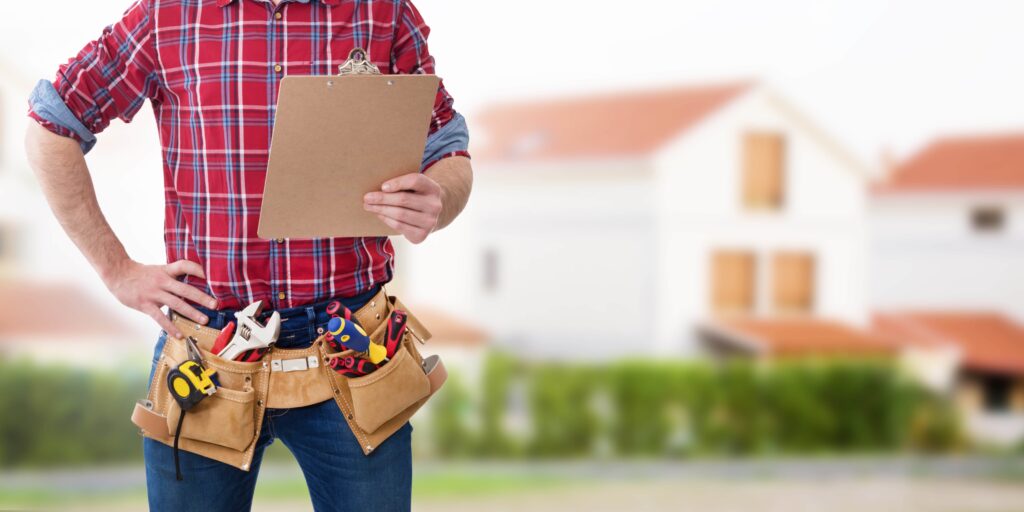 A professional home contractor wearing a tool belt and holding a clipboard, standing in front of a blurred residential house background and OTOW Ocala home improvement guidelines.